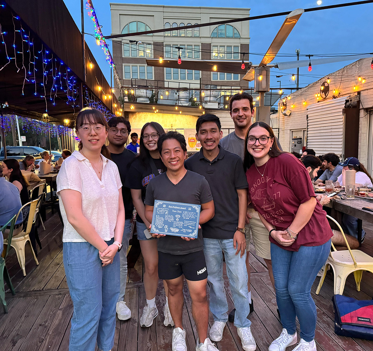 Time being presented the Best Professor Award by his group (Pitroom BBQ, Houston, 2026)