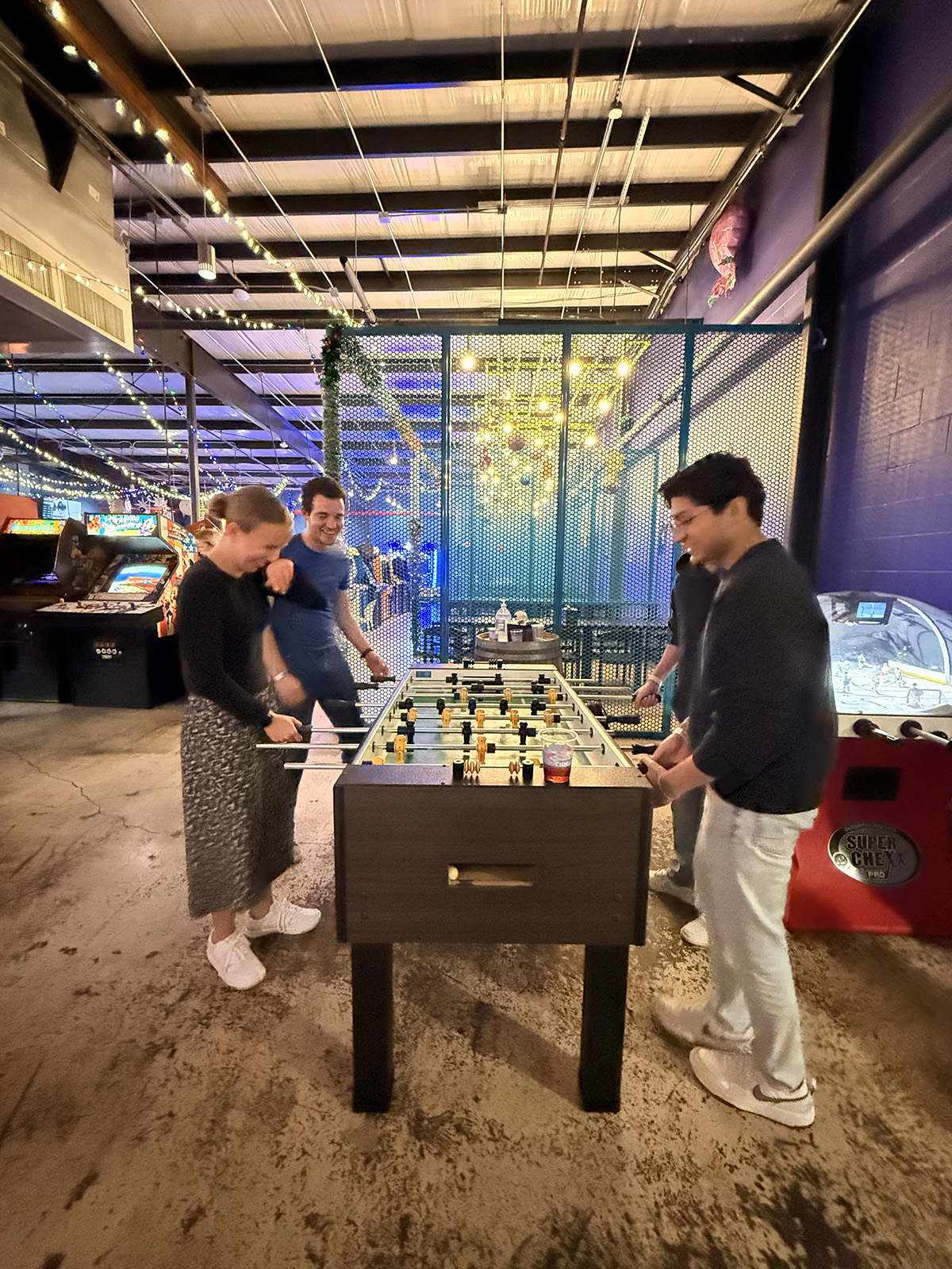 Lab members at an arcade (Cidercade, 2025)