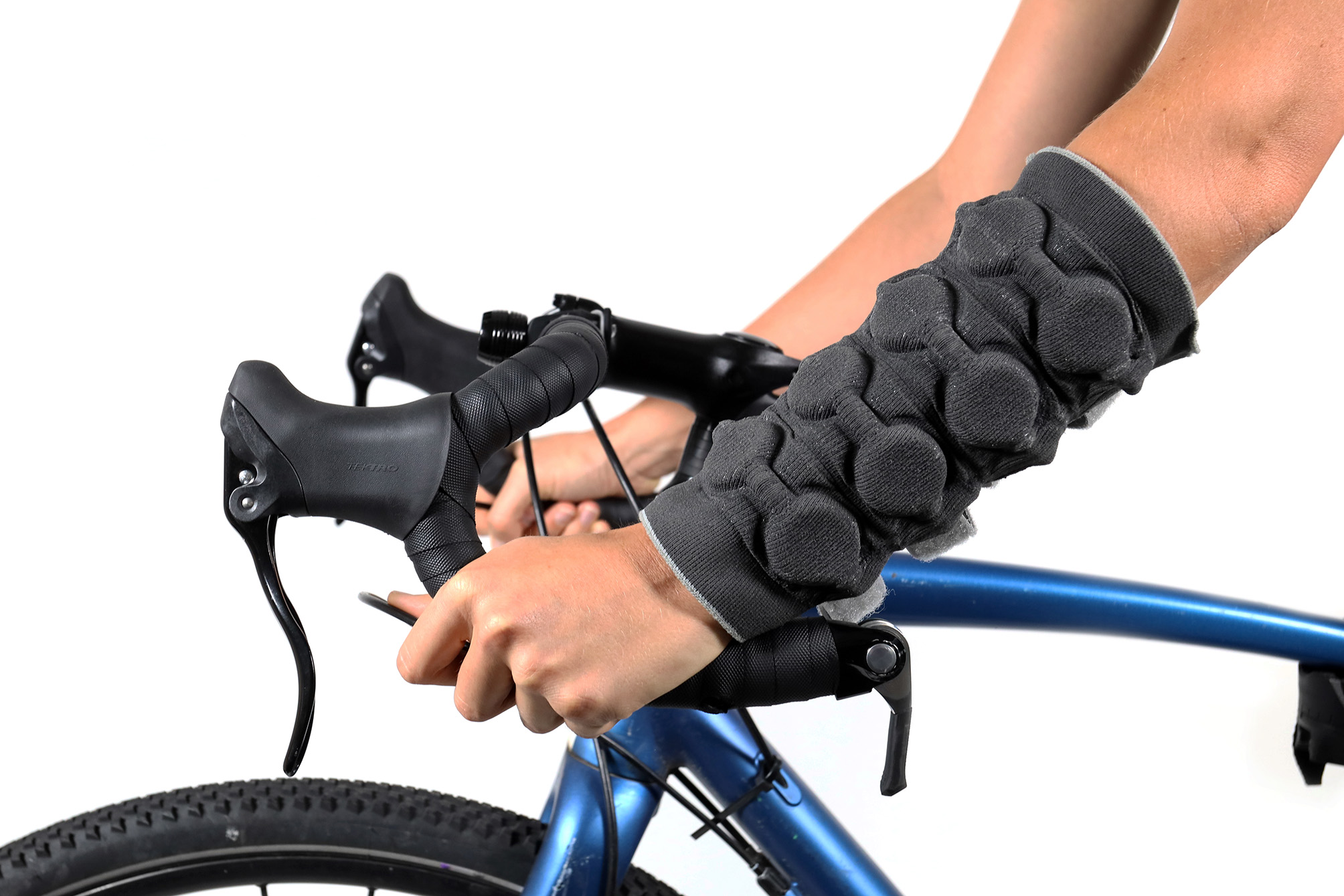 A knitted forearm sleeve with embedded pneumatic actuators for haptic feedback