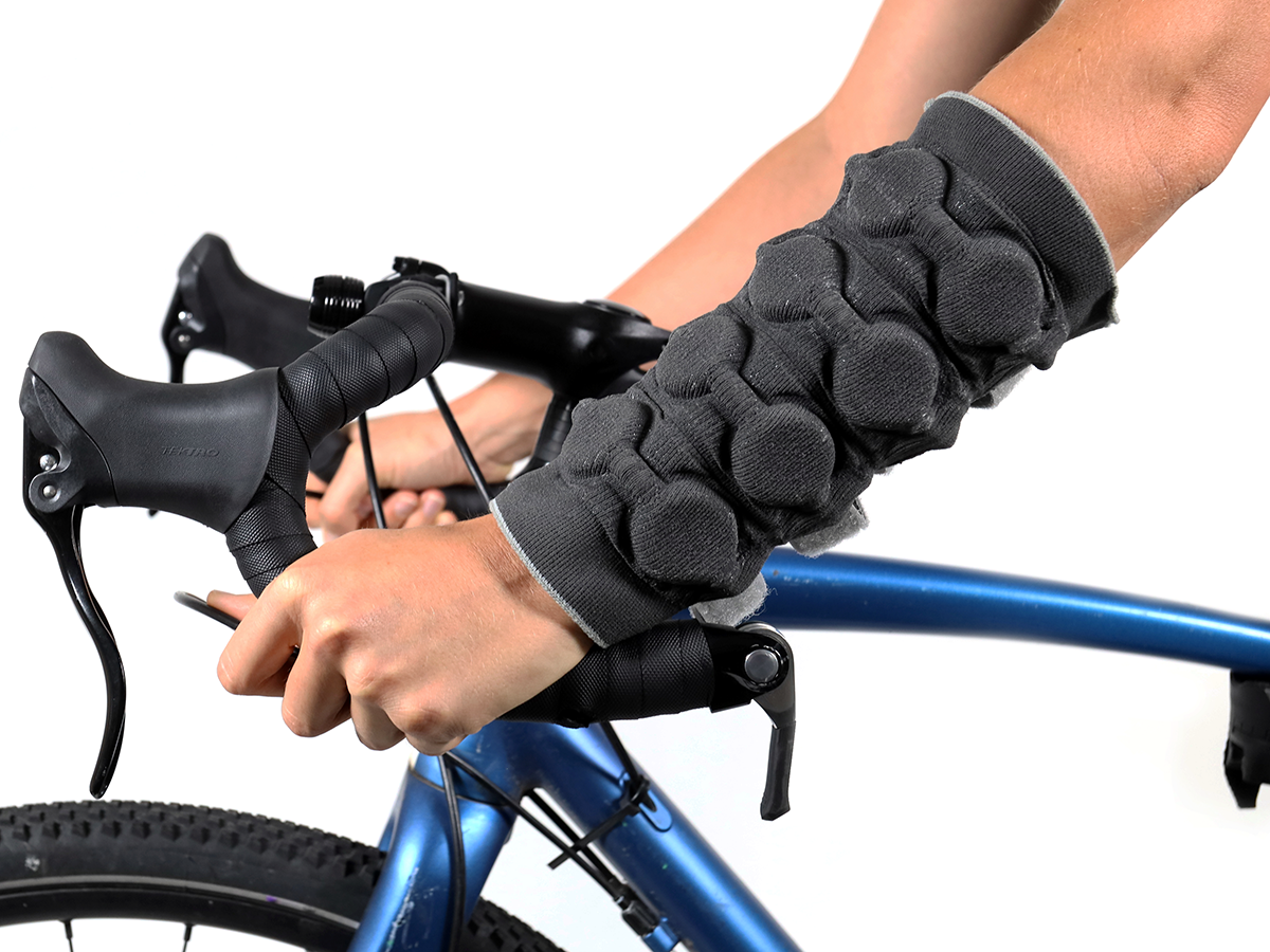 A knitted forearm sleeve with embedded pneumatic actuators for haptic feedback